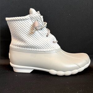 Sperry gray and white boots.